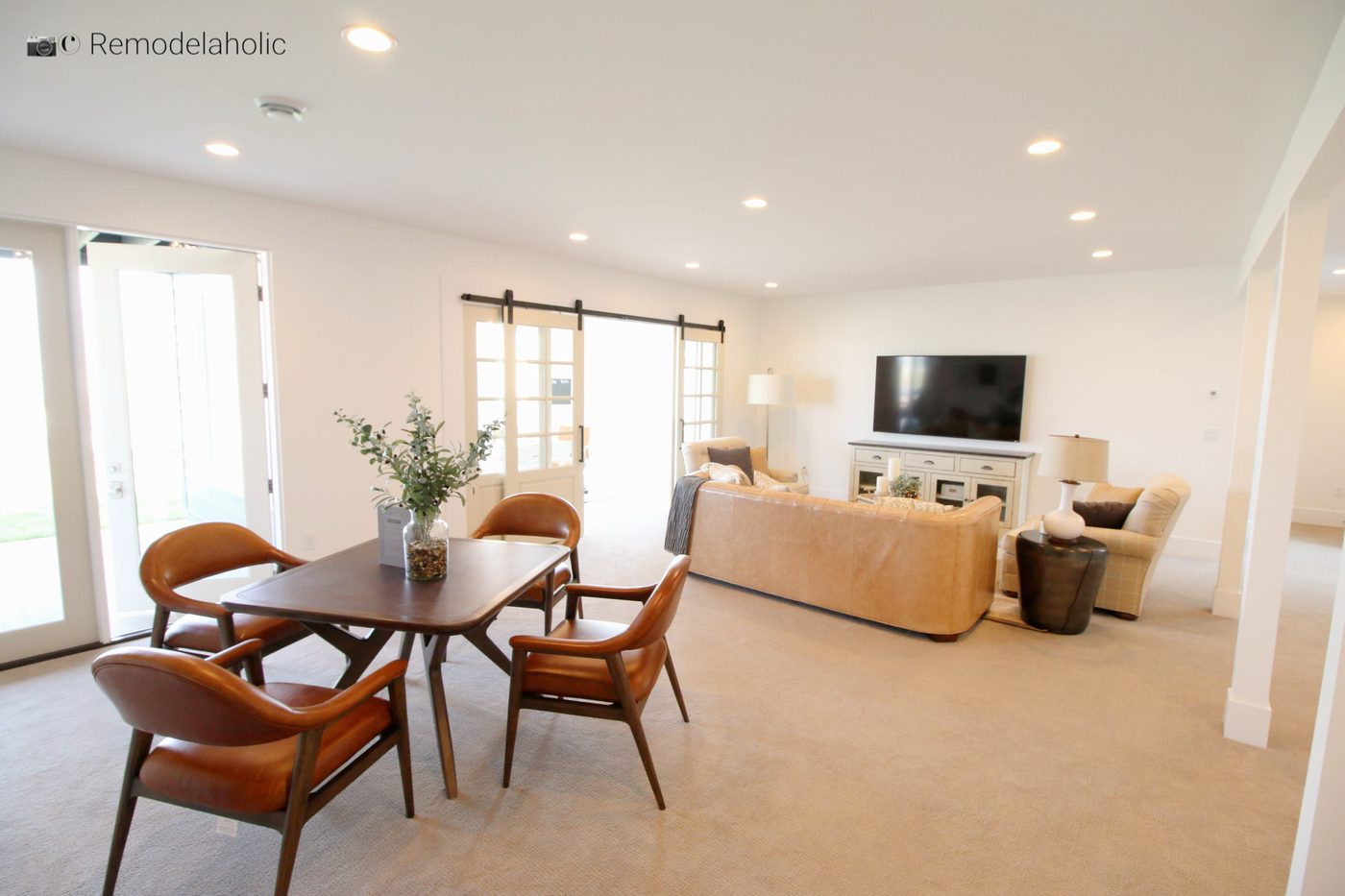 Game room table with comfy modern chairs, SLPH 2018 Home 13 Magleby Communties, Photo by Bekob