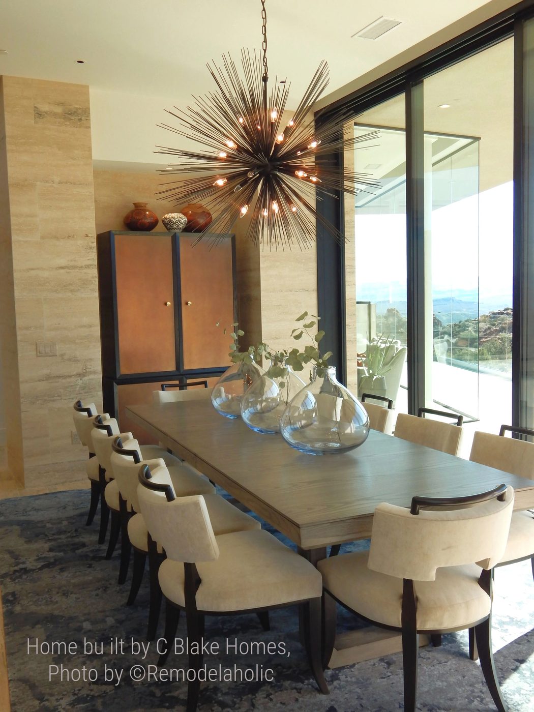 Modern style light fixture in the dining room. SGPH 2018 Home 4 C Blake Homes, Photo by Bekob