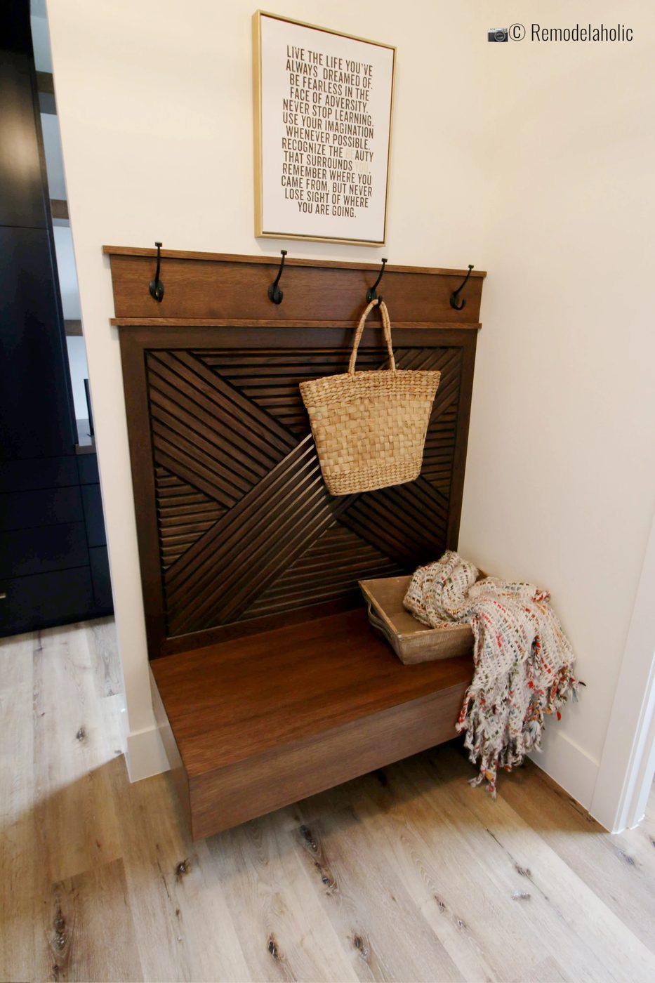 Add blankets and pillows for a cozy mudroom bench. SGPH 2019 House 04 Interstate Homes, Photo by Bekob