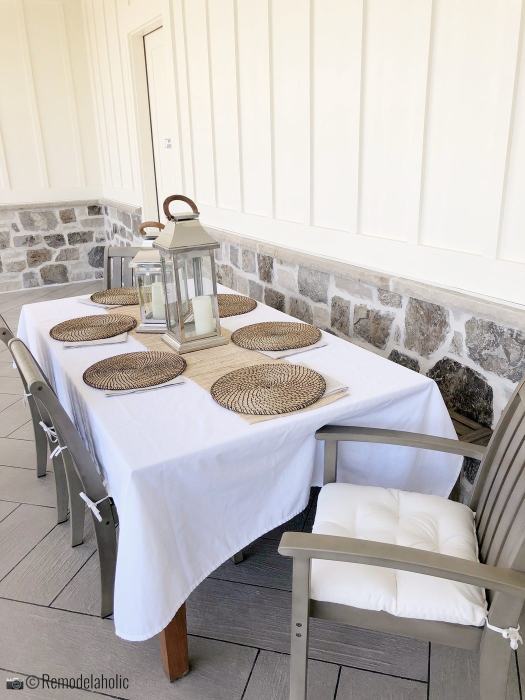 Neutral patio dining set. UVPH 2018 Home 33 E Builders, Erin Hansen Design, Photo by Bekob