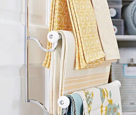 Linen Closet Makeover Towel Bars- BHG