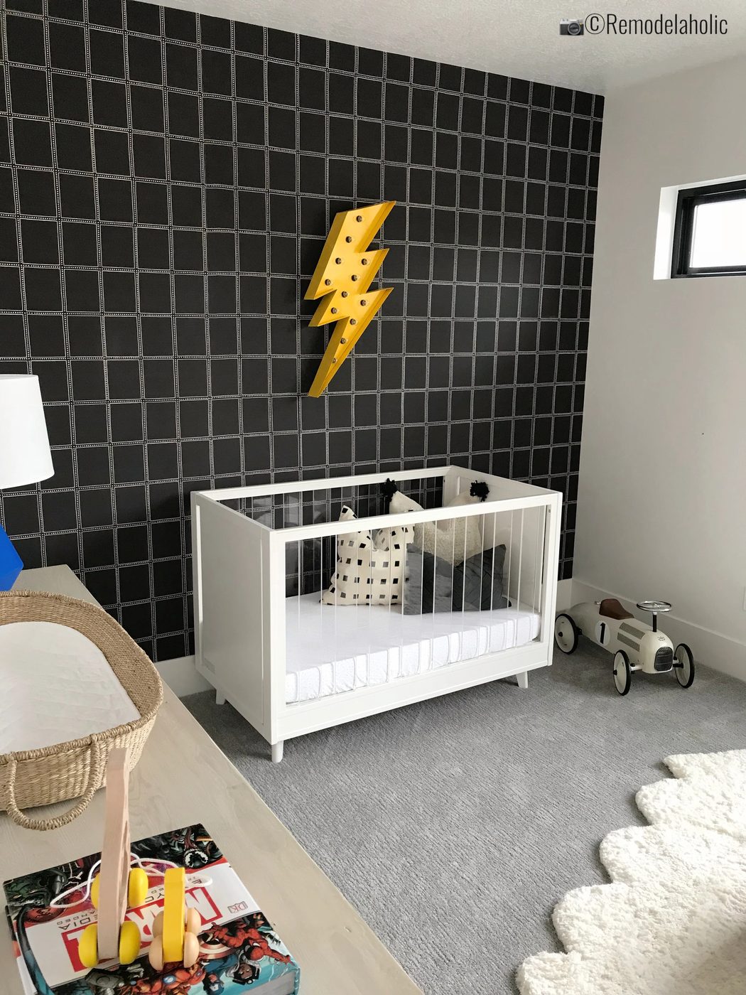 clearly hero nursery complete with a cute graphic wallpaper, UVPH 2018 Home 26 Murdock Builders, Photo by Bekob