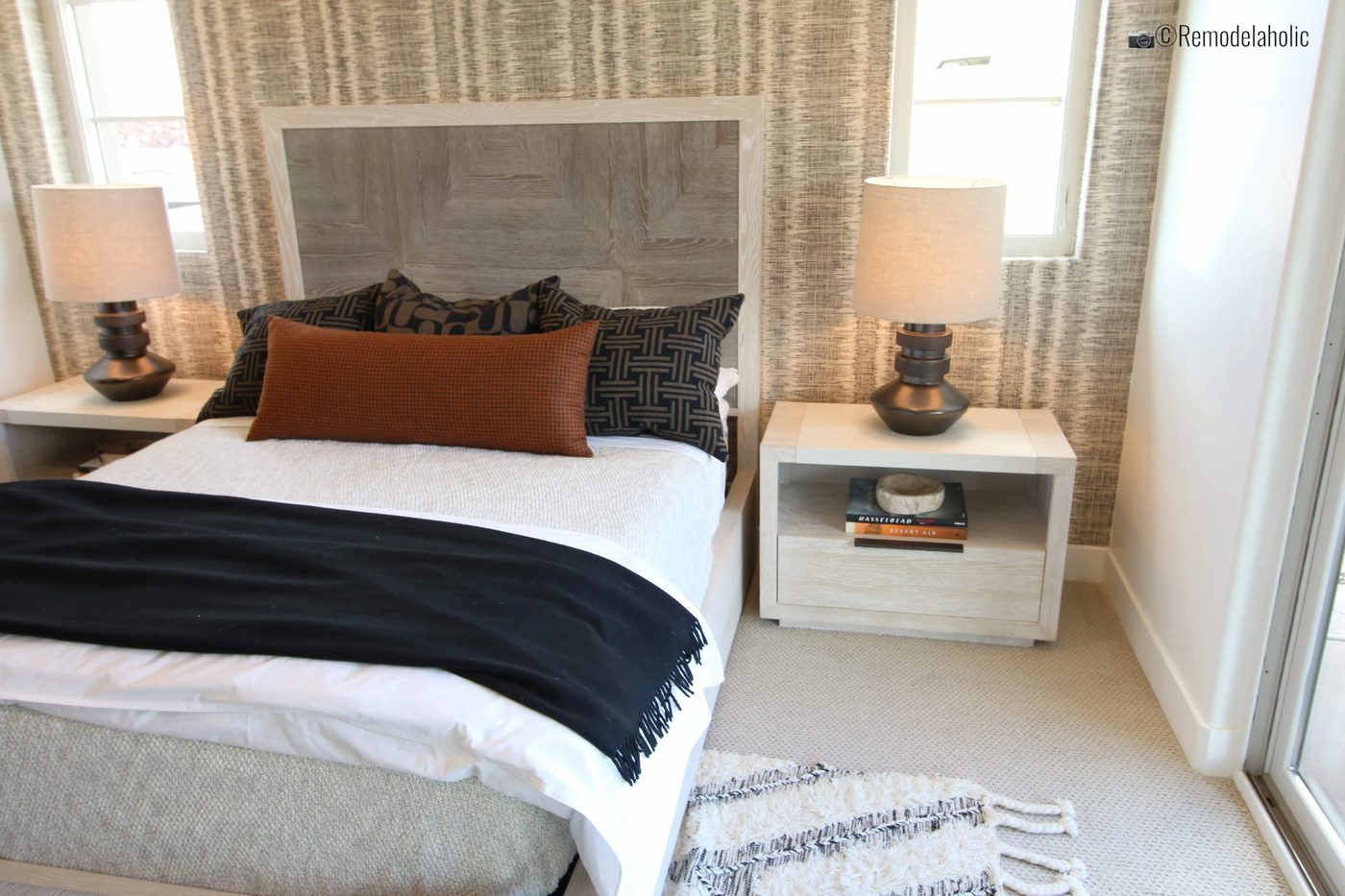 Modern and neutral master bedroom with wallpaper feature wall, SGPH 2019 House 16 Brian Geer Development, Inc, Photo by Bekob
