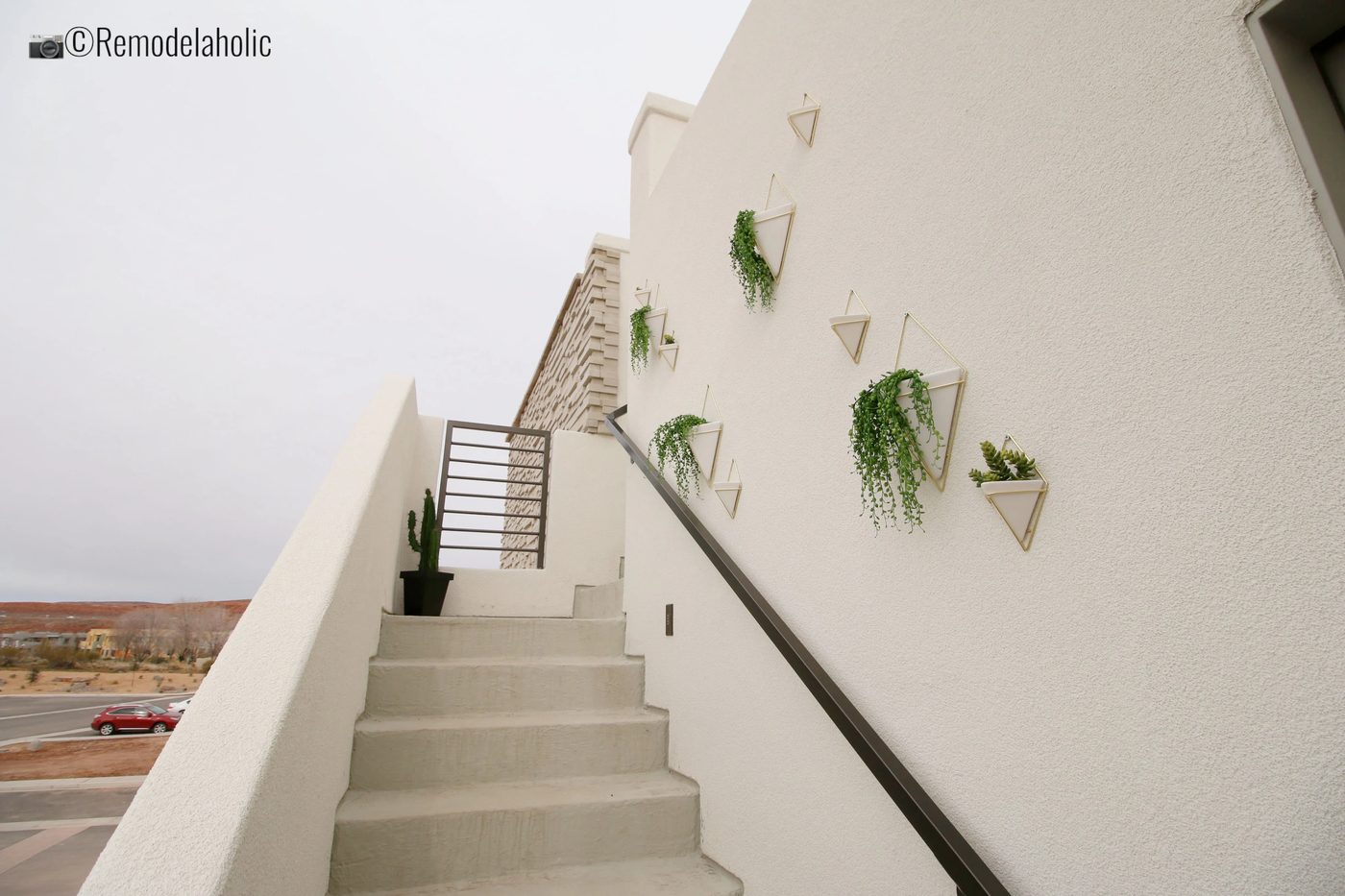 Hanging Planters Wall for outdoor decor, SGPH 2019 House 03 Cole West Resorts LLC, Photo by Bekob
