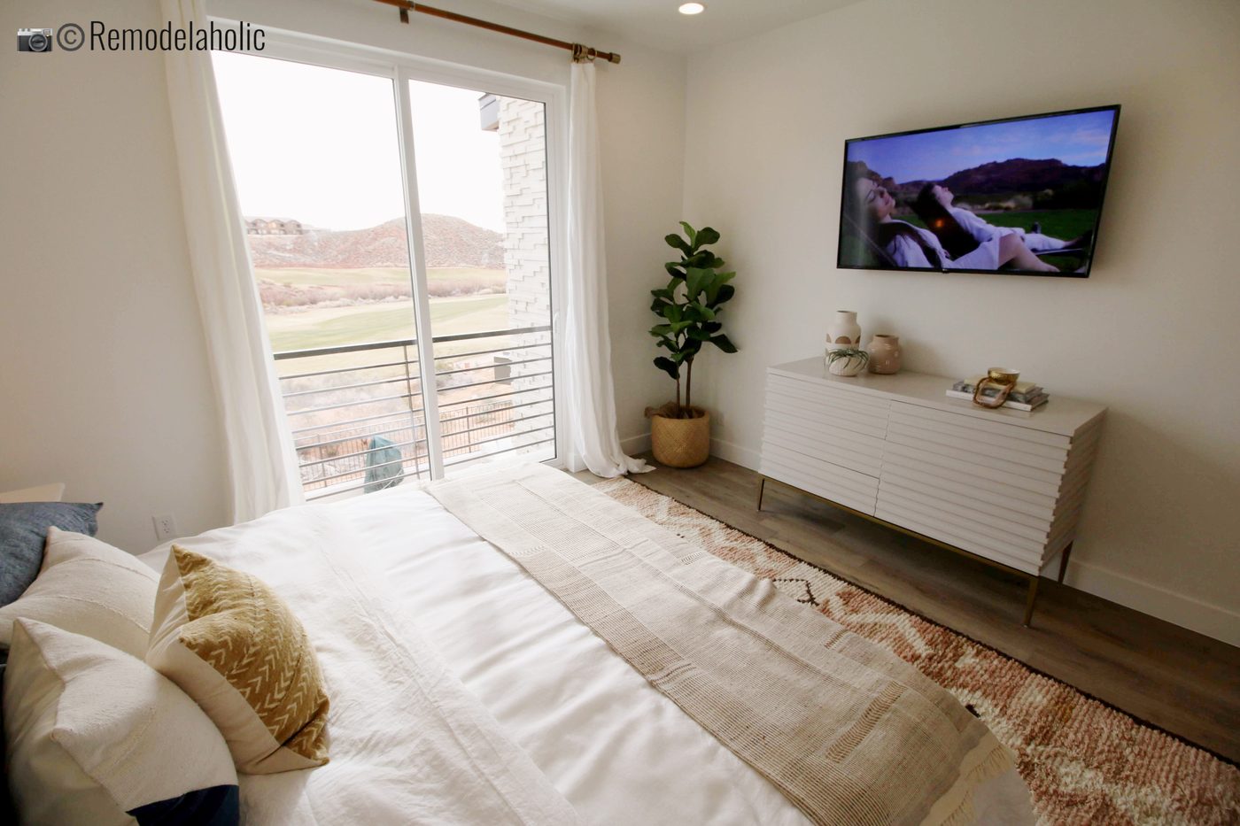 A woven basket planter for added texture in the bedroom decor, SGPH 2019 House 03 Cole West Resorts LLC, Photo by Bekob