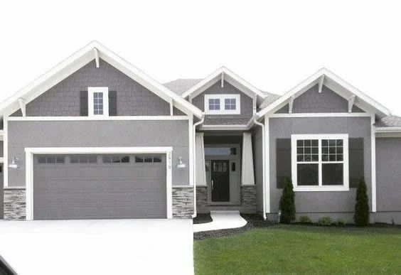 Garage Door Curb Appeal On Grey House With White Trim