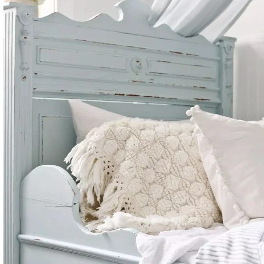 Wooden Colored Bed With White And Cream Bedding
