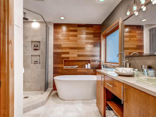 striking bathroom renovation with Handmade wood plank wall