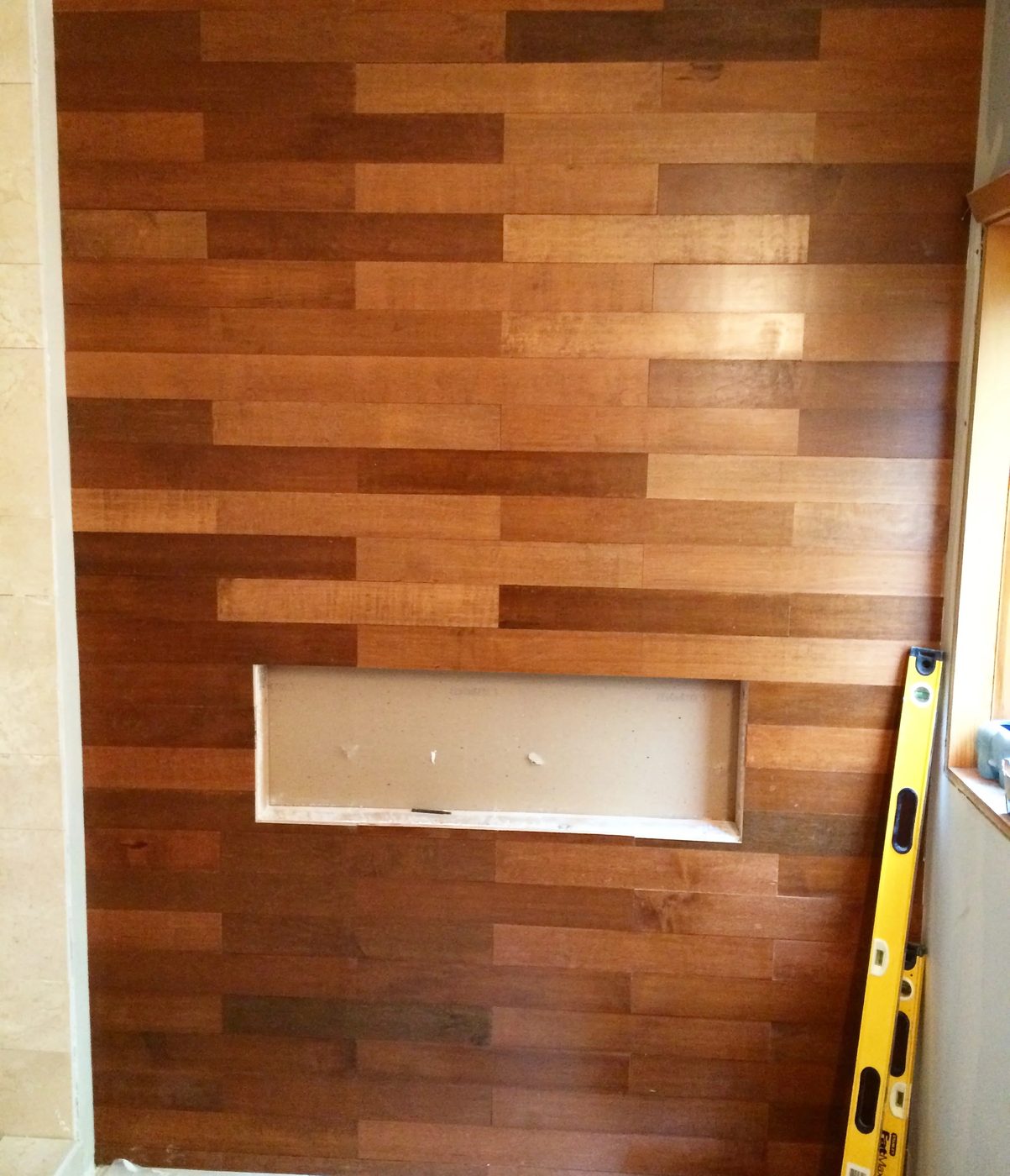 how to install a stacked brick pattern stained wood plank wall