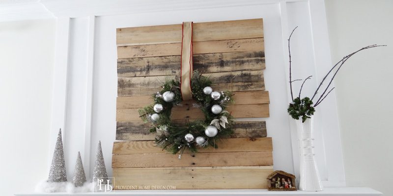 christmas mantel with chimneypiece woodwork above fireplace - Provident Home Design featured on @Bekob