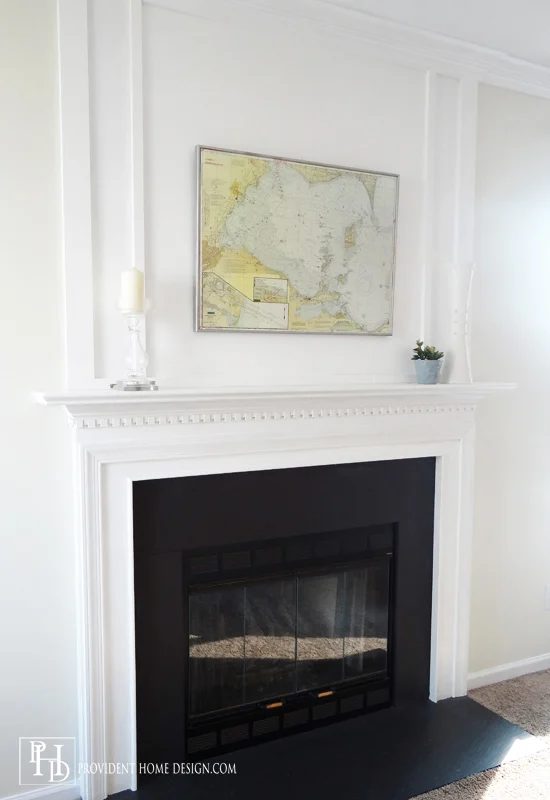 How to Add Woodwork Trim Above a Fireplace Mantel - Provident Home Design featured on @Bekob