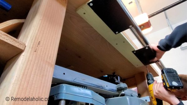 11 Predrilling Holes To Attach The Table Saw Fence Front Rail To The Workbench With 1 4 Inch Bolts