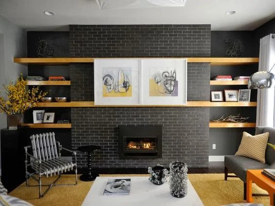 great shelves around the fireplace, and those art canvases are hiding the TV!