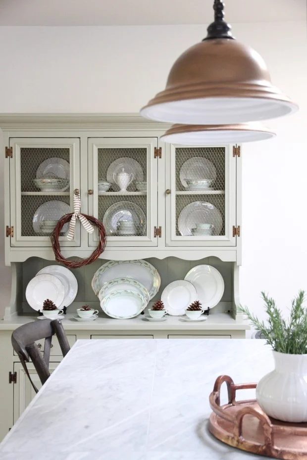 Handmade faux copper light and Handmade marble tile countertops = vivid kitchen