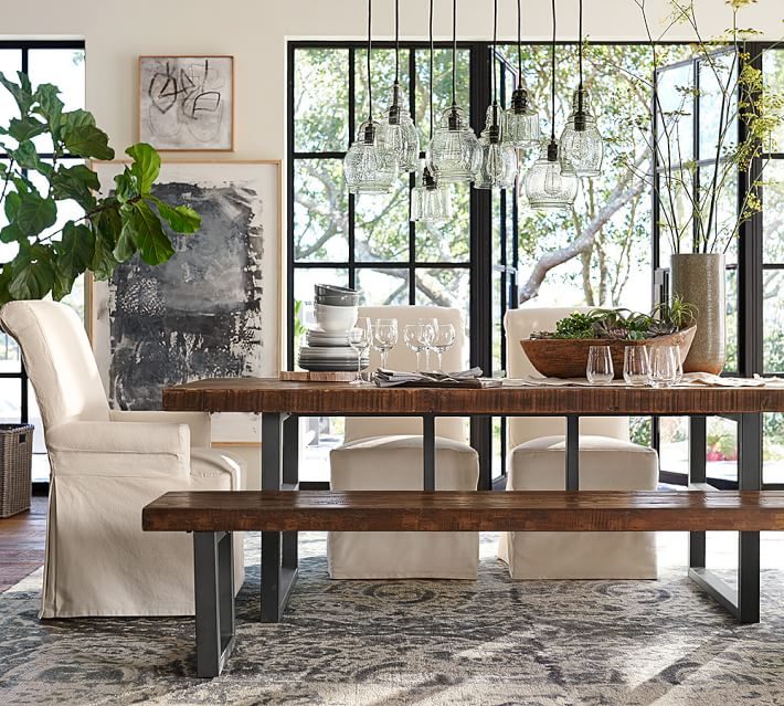Vintage Style Rug In Dining Room Via Pottery Barn
