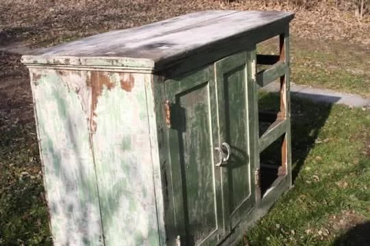 She turned this old castoff piece into a vivid built-in hutch for her dining room!