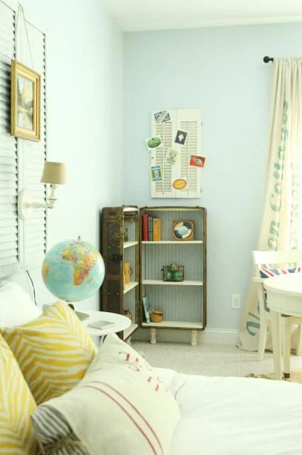 antique trunk bookshelf in the cottage guest room, featured on Bekob.com