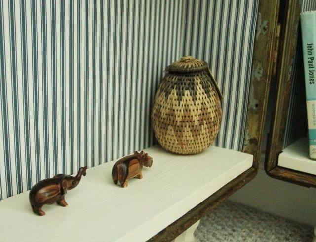 travel momentos details of antique trunk bookshelf, featured on Bekob.com