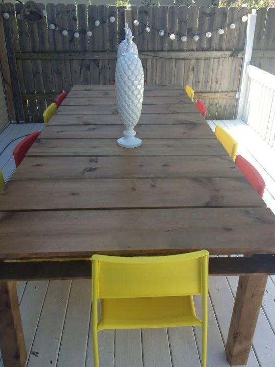 Outdoor dining table out of pallets and 15 solid pallet furniture options featured on Bekob.com