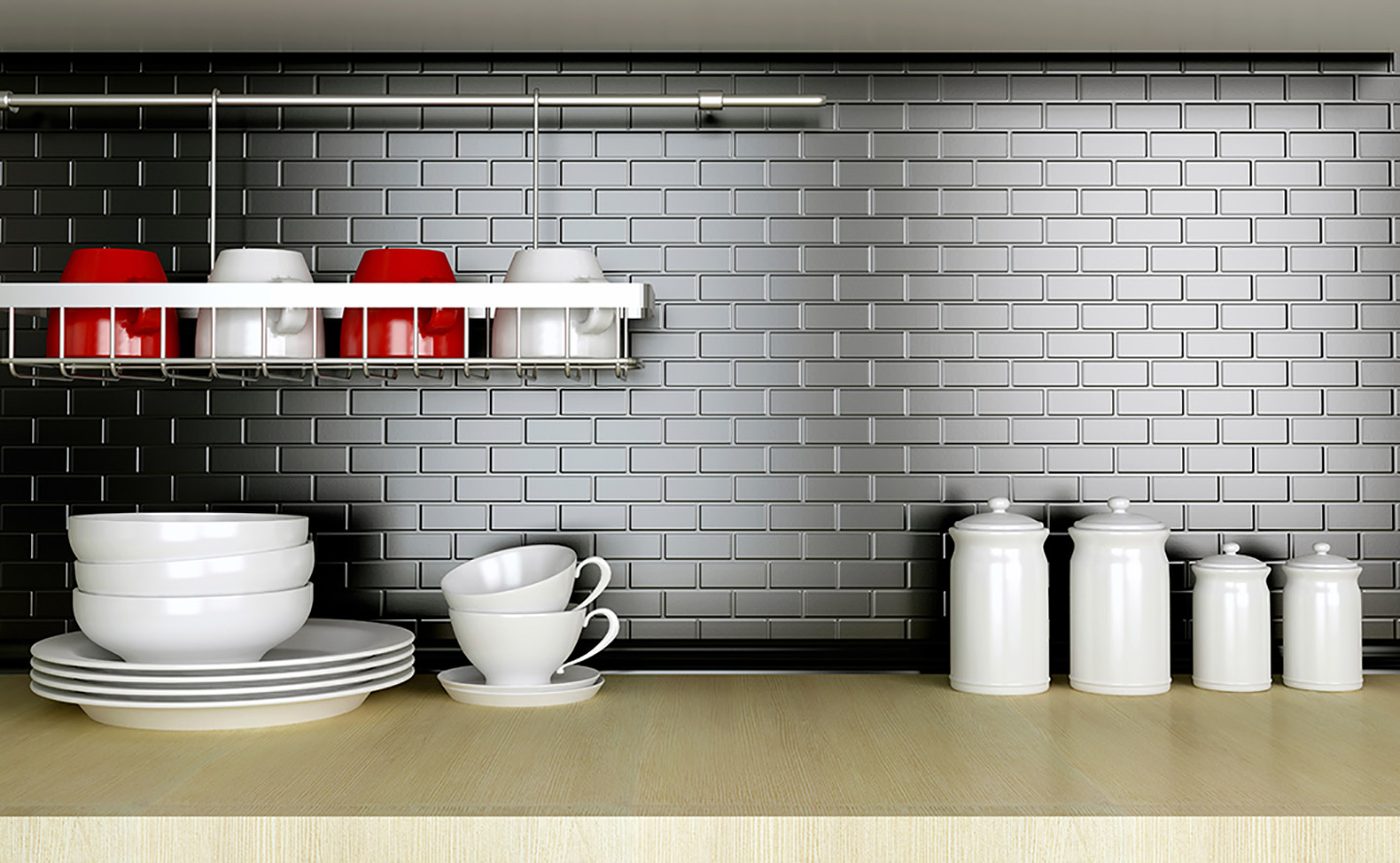 Ceramic kitchenware on the wooden worktop. Black and white kitchen design.