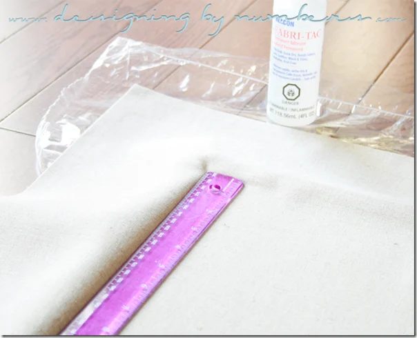 Use a ruler to secure the fabric in the edges