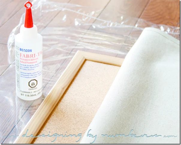Apply glue along the corkboard against the frame's edge