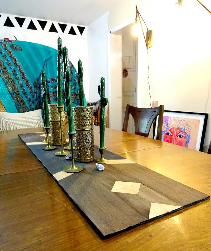 bohemian interiors an unusual take on a table runner. southwestern inspired balsa wood design.