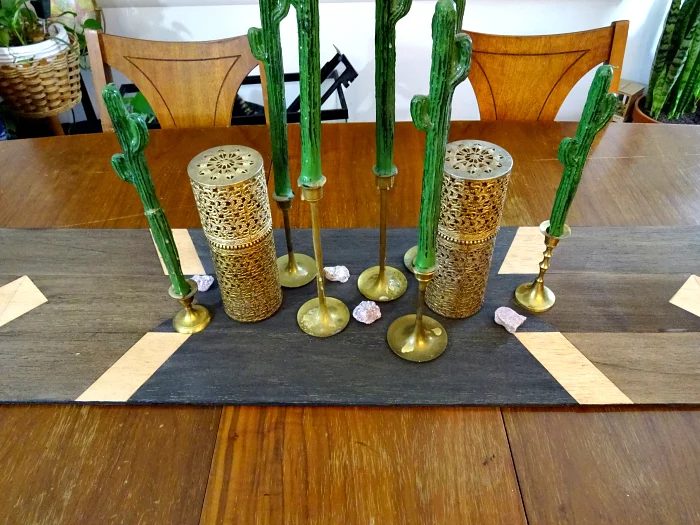 brassy and whimsical dining room table centerpiece