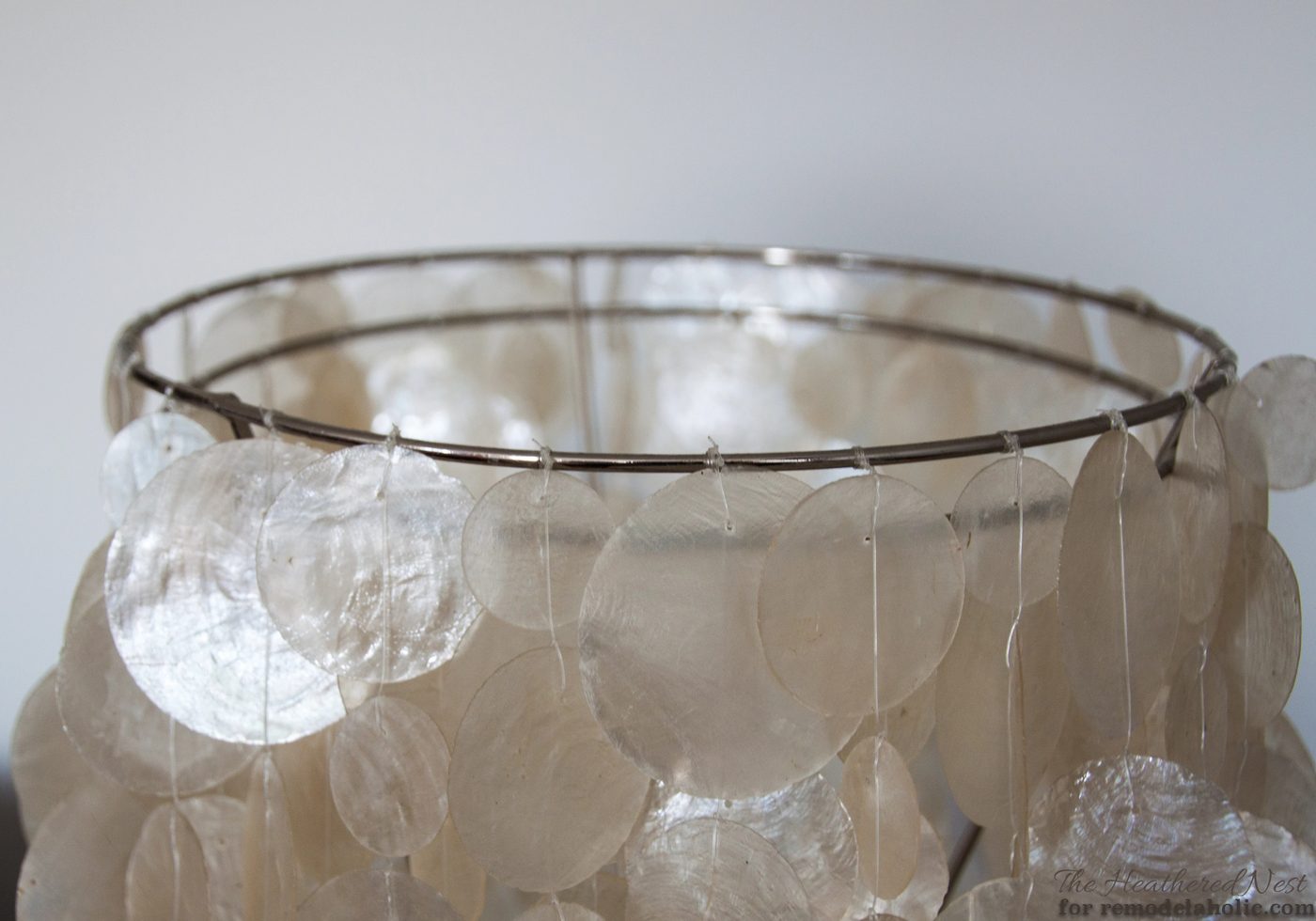 Ban your boob light! Change it to a drum shade or capiz fixture in as little as five minutes, no tools required!