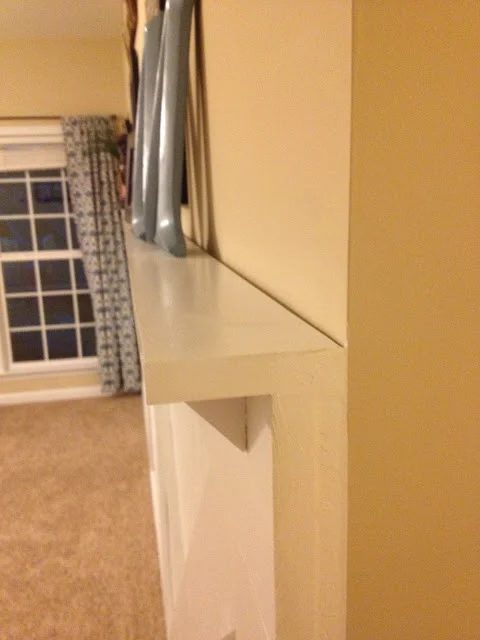 install a wall ledge on an uneven wall with barn door wainscoting