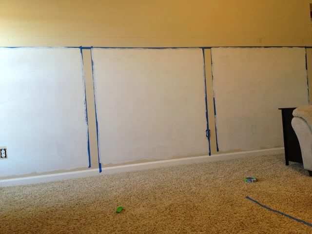 paint the wall behind barn door wainscoting wall treatment