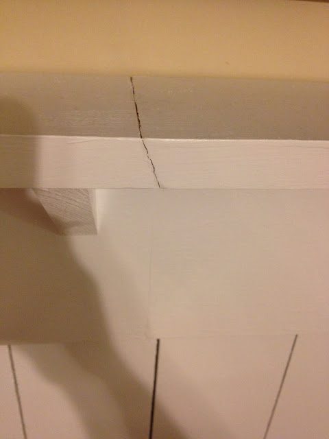 cut ledge boards at an angle for a seamless finish on the barn door wall treatment