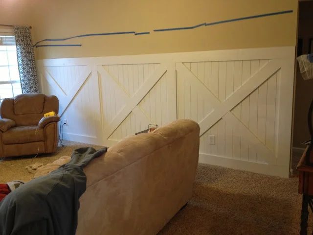 almost done with the barn door inspired wainscoting