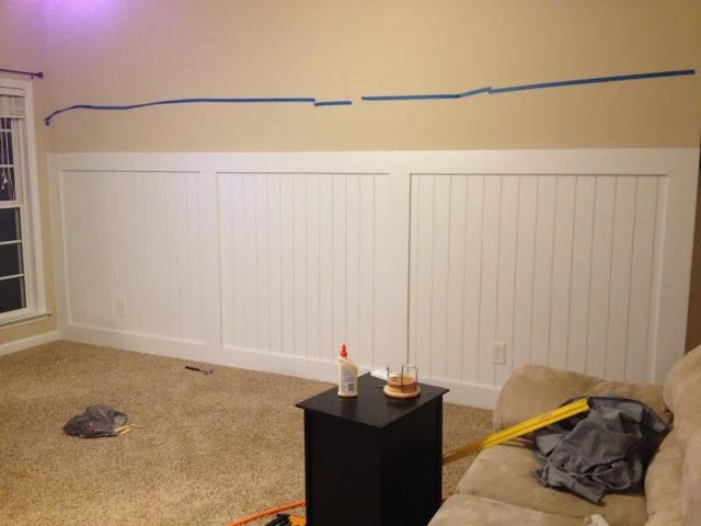 barn door wainscoting wall treatment almost finished
