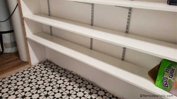 Basement Storage Room With Tile Floor And Track Shelving Storage, Bekob (1)