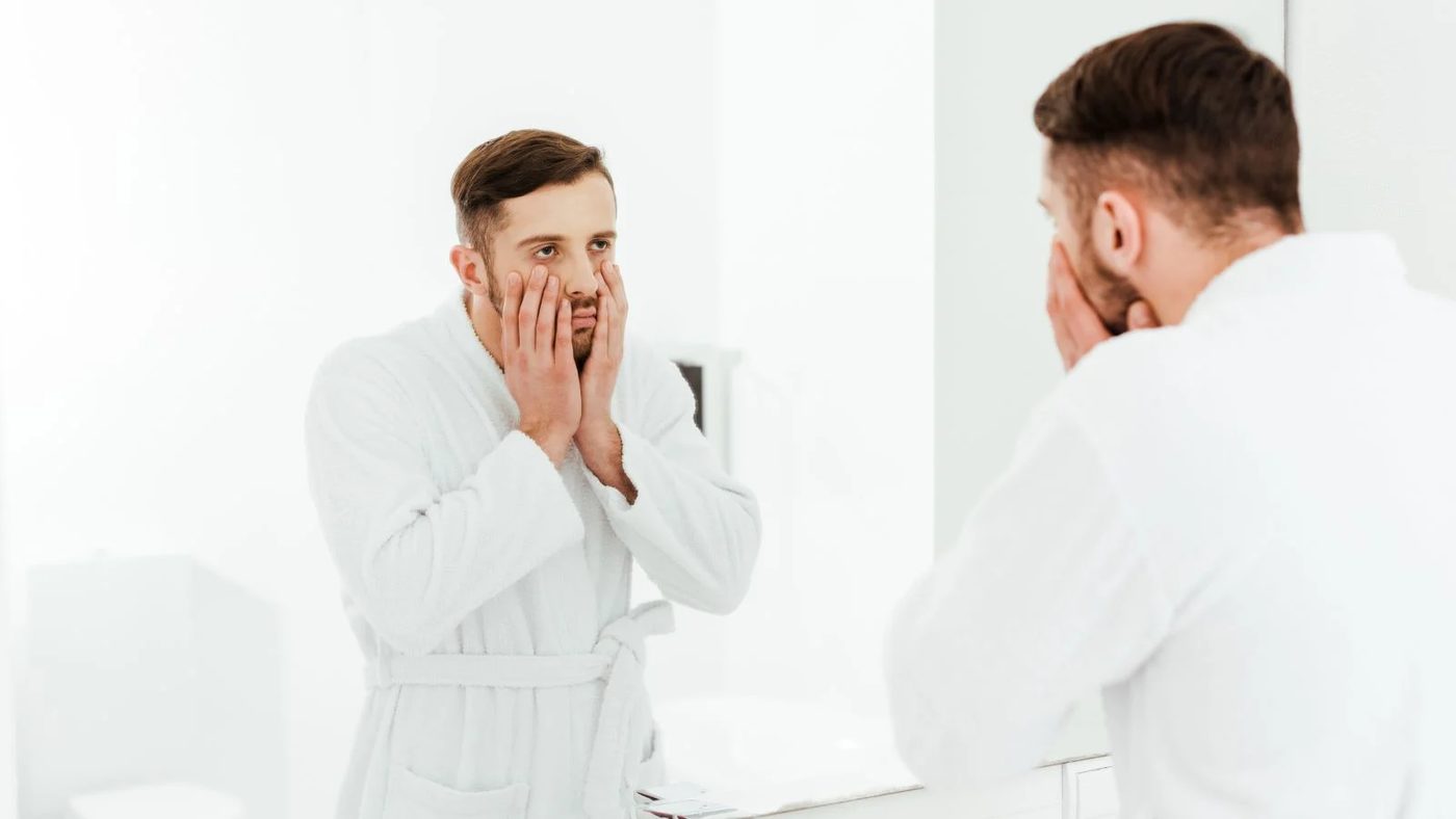 Sad Man In The Bathroom