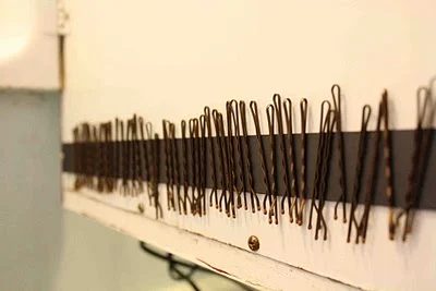 Superwoman bobby pin storage