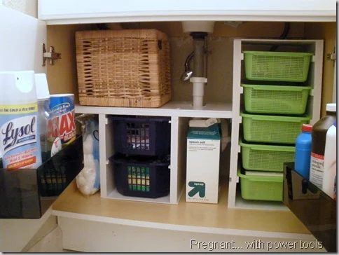 Pregnant with Power Tools under sink organized
