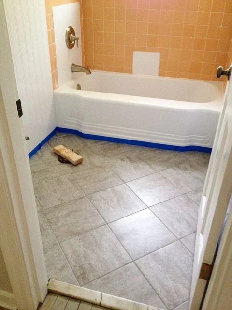 Updating an old bathroom with graoutable peel and stick tiles (6)