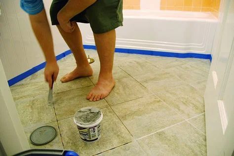 Updating an old bathroom with graoutable peel and stick tiles (4)