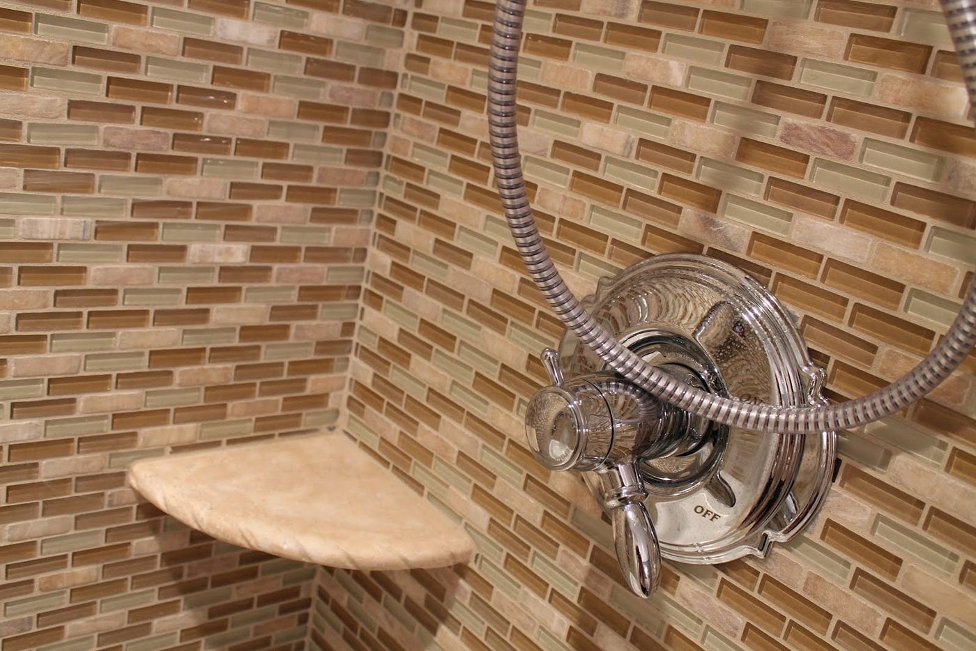 27 Shower makeover using mosiac glass and natural stone tiles, by Elizabeth and Co featured on @Bekob