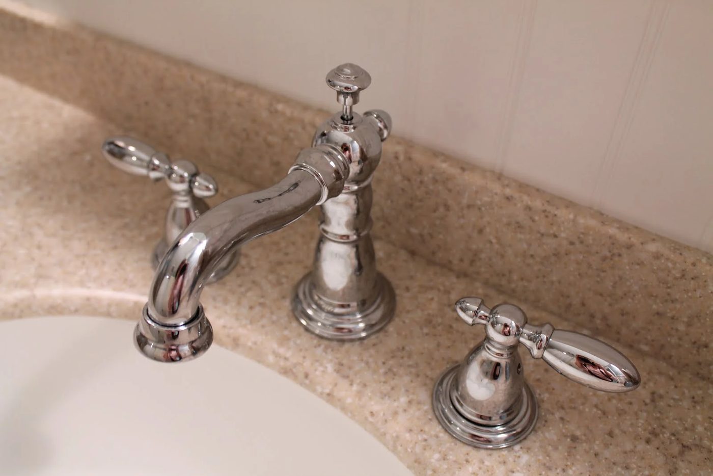 12 Delta faucets in bathroom remodel, by Elizabeth and Co featured on @Bekob