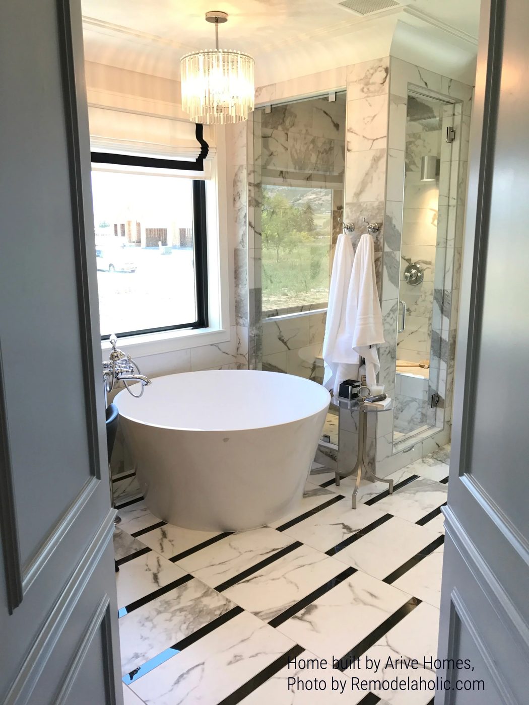 Round Bathtub With Bold Floor Tile Arive Homes (560)