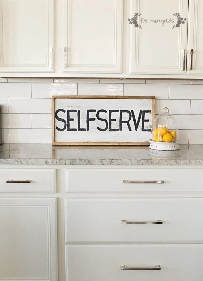 white kitchen with self-serve reversible sign, Five Marigolds