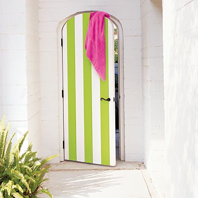 striking Doors - lime green striped door via Coastal Living
