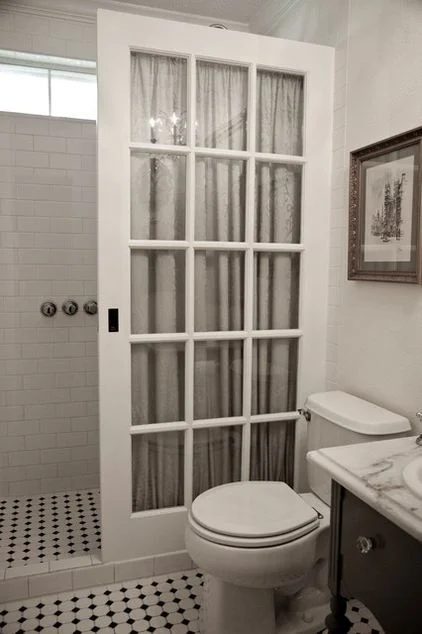 striking Doors - old pocket door used as shower enclosure via Houzz