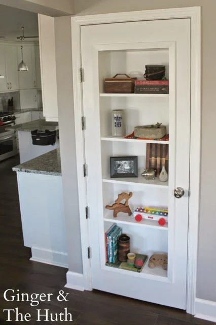 striking Doors - Handmade bookshelf door made from solid core door Ginger and the Huth