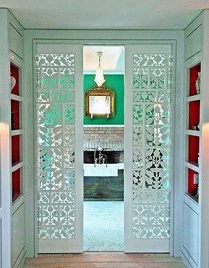 striking Doors - ornate pocket doors via My Design Chic