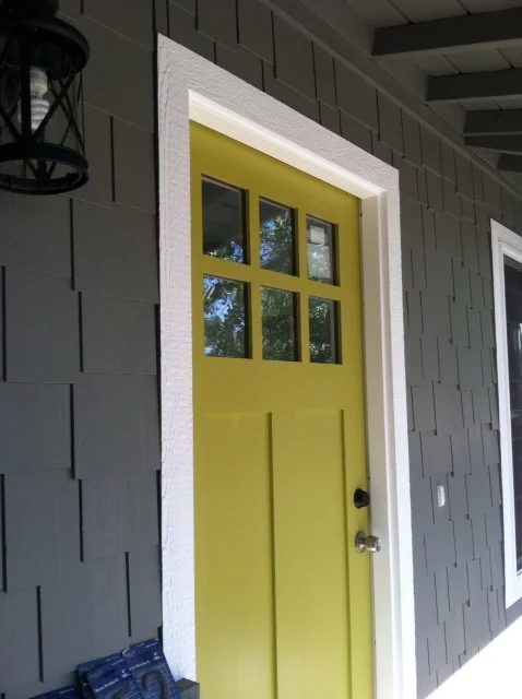 striking Doors - entry door on gray house painted in Sherwin Williams Antiquity by Chic Little House