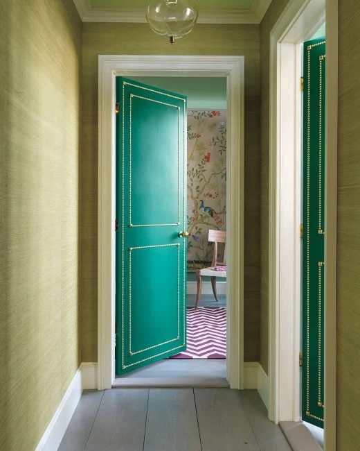 striking Doors - Handmade painted door with nailhead trim via Martha Stewart